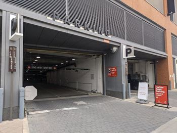 a parking garage with its door open at 1305 Dock Street, Baltimore